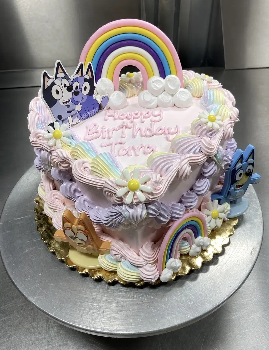 Bluey rainbow cake decorated by Kadie Young